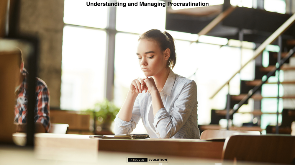 Understanding and Managing Procrastination - image of woman siting at the desk